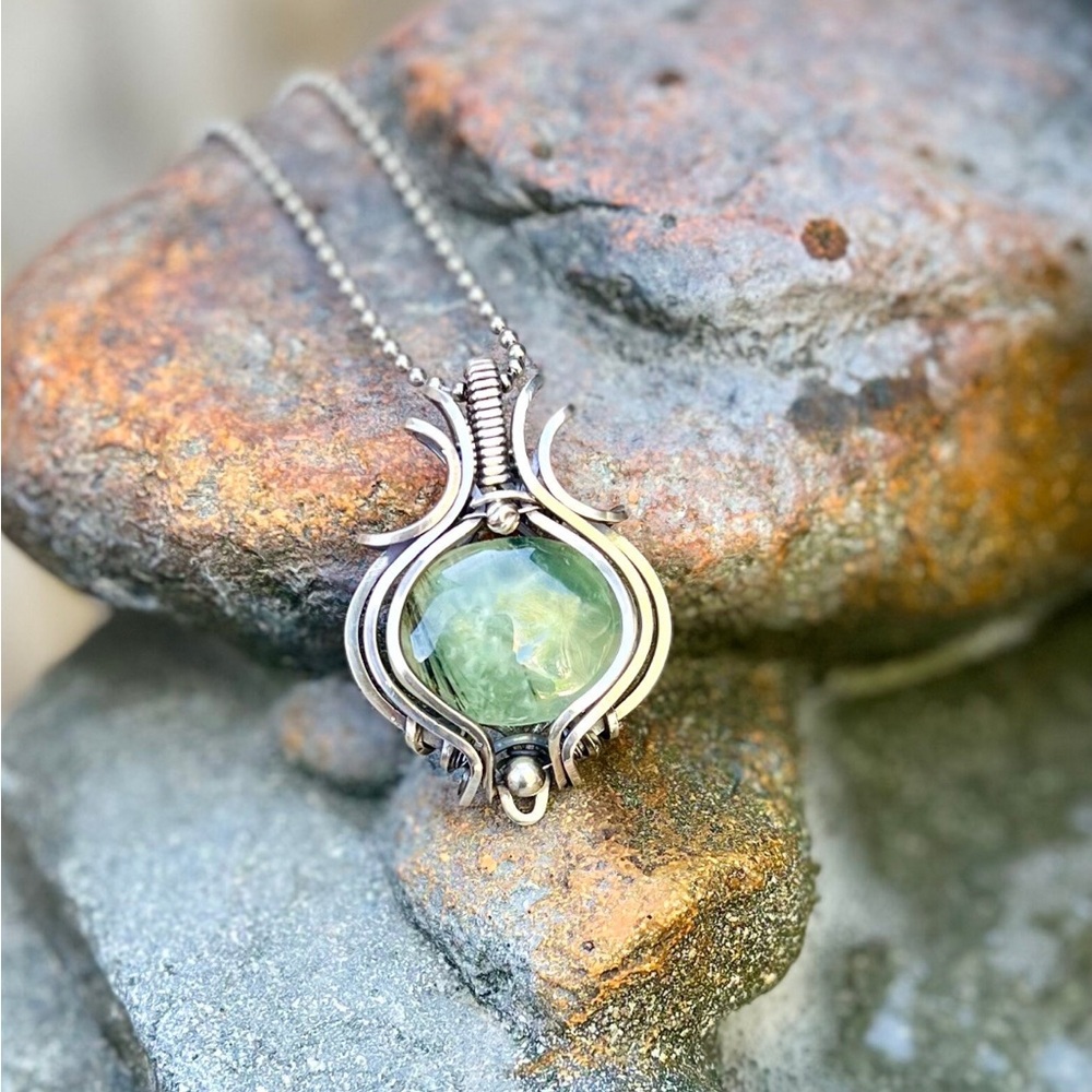 Prehnite pendant wrapped with solid sterling sliver